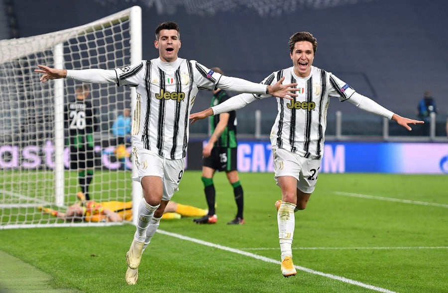 Lucky' late Morata strike seals Juventus last-16 berth